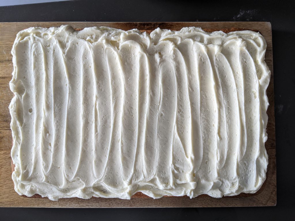 vanilla buttercream on vanilla sheet cake