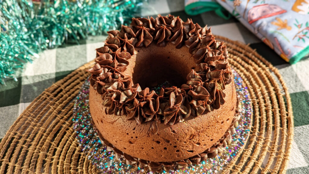 gluten free chocolate bundt cake with chocolate fudge icing